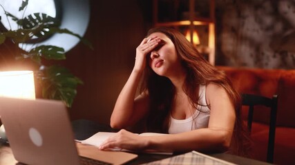 Boring tired young student or freelancer falling asleep during study or work at home workplace late Stressed female exhausted from remote distance work or education and hard program indoors