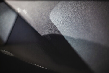 Abstract automotive interior texture with modern materials and soft light