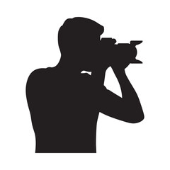 Silhouette of a photographer taking a picture