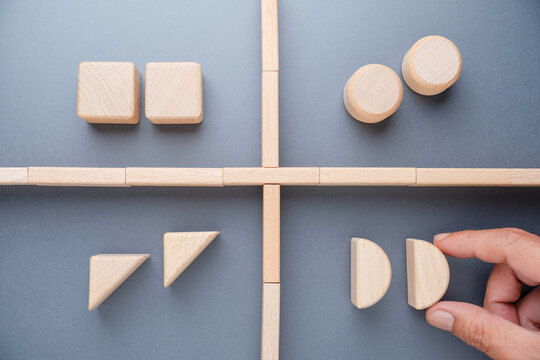 Wooden blocks arranged by type representing category segmentation