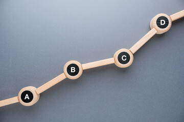 Upward progress path with wooden blocks and data points