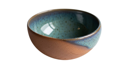Artisanal ceramic bowl with a unique bluegreen glaze on the inside and a natural, unglazed brown exterior, isolated on transparent background