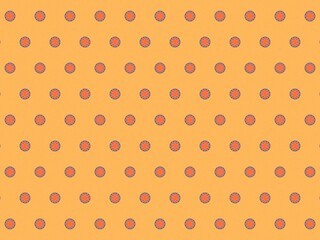 A repeating pattern of small floral shapes on yellow background.