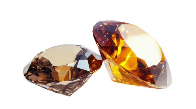 Two faceted amber colored gemstones isolated on transparent background