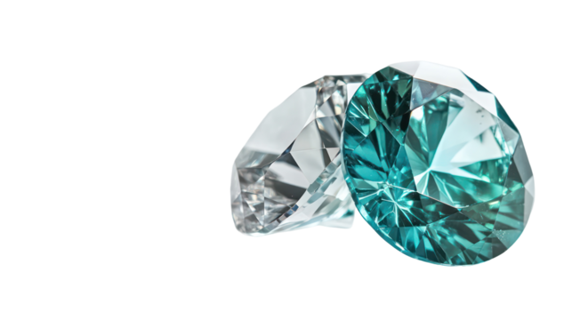 Two brilliant cut diamonds with blue and green hues isolated on transparent background