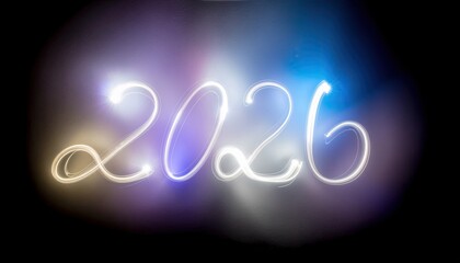 Glowing number 2026 painted with light, dark backdrop