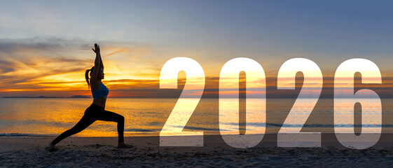 Happy new year card 2026. Silhouette lifestyle woman yoga practicing yoga standing as part of Number 206 near the beach at sunset. Healthy and Holiday Concept