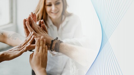 Group of diverse team joining hand in the middle