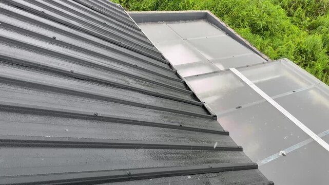 Heavy Rain Falling on Black Roof &ndash; Close-Up Atmospheric Weather Footage