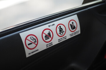 Naklejka premium Rules displayed inside a vehicle for passenger safety