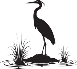 Fototapeta premium Black silhouette of a heron standing in water with reeds