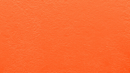 Vibrant orange plaster background, dynamic design projects with rough texture