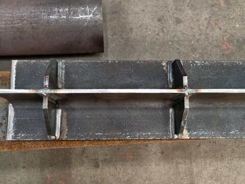 industrial steel structure, steel channel assembly featuring ground seams and alignment indicators
