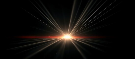 Bright Lens Flare Effect with Starburst Rays on Black Background.