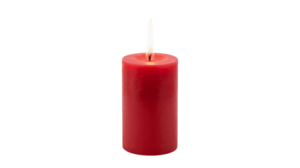 Burning red pillar candle creates warm ambiance for relaxation or celebration