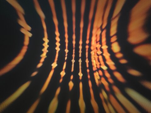 abstract wavy lines in dark background