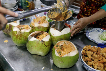 Steamed seafood in coconut, Thai food