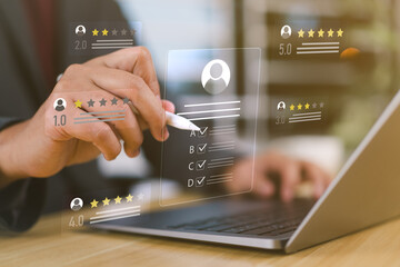 Businessman reviewing digital resumes through a virtual interface, illustrating online recruitment,...