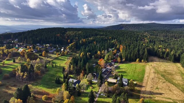 rural landscape amidst dark clouds, expansive agricultural lands under foreboding weather conditions