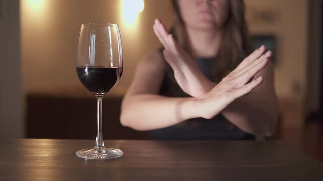 Unknown woman is refusing wine. Sober lifestyle
