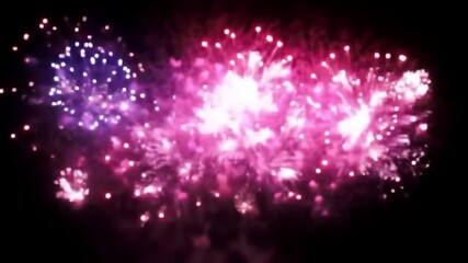 Loopable animation of glowing pink and purple fireworks bursting on black background for New Year celebration and party overlay 4k video - Powered by Adobe
