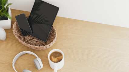 Digital detox devices in basket and coffee on wooden table copy space. 3d rendering