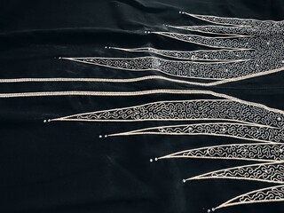 background and pattern of Turkish Dubai fabric in the form of lines and several motifs