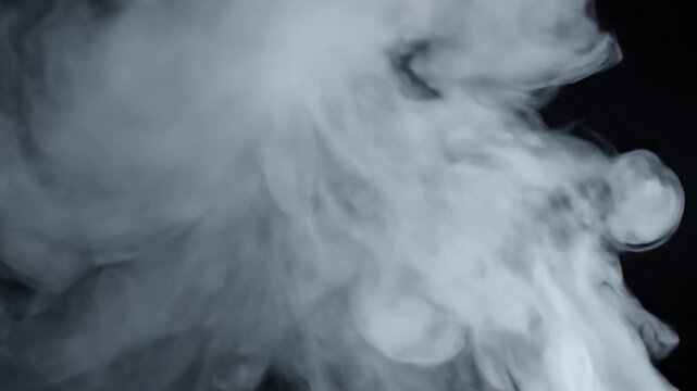 Dynamic ethereal smoke plumes gracefully expanding and swirling, creating mesmerizing abstract patterns against a deep, dark background. close up Smoke effect, Abstract, Volumetric, Ethereal,?