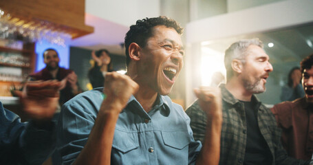 Excited people, winning and watching tv with fist pump for sport victory, support or success in pub. Happy group, men or fans with celebration for goal, online entertainment or score in local bar