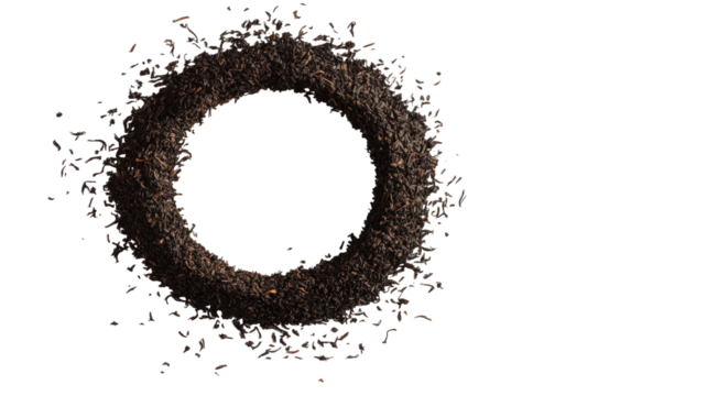 Pile of dry black tea leaves with rich aromatic texture loose leaf beverage ingredient natural dark blend isolated on white background