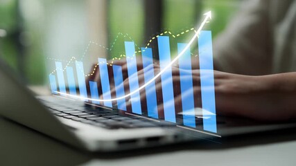 A business professional engages in data analysis on a laptop, accompanied by digital graphs depicting growth trends and performance metrics in a modern work environment. Copula - Powered by Adobe