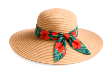 A graceful straw beach hat, crowned with a vivid floral band, displayed on a pristine white surface.