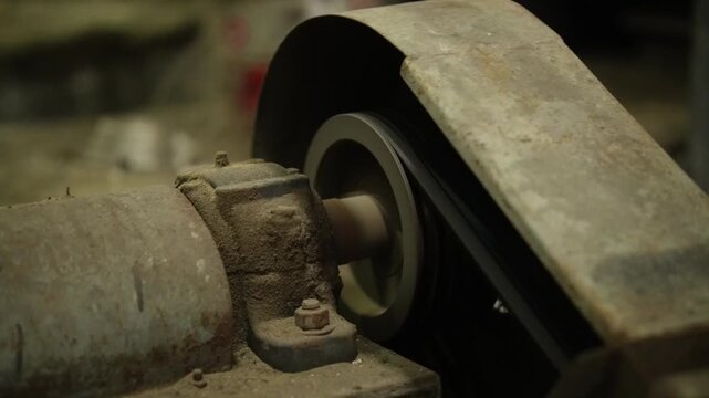 Footage machine motor speed working in industrial area. Electrical workshop close up motor gear pump industry. Electricity business manufacturing. Factory building industrial plant 