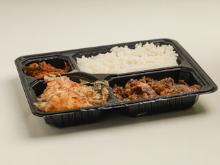Chicken teriyaki bento set on white background