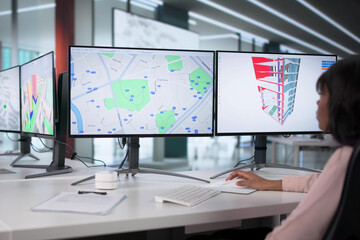 Engineers Using GIS Software Inspect Construction Project Valuation