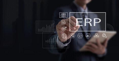 ERP, Enterprise Resource Planning concept. Business man working on laptop using software connecting data to access HR management. Business resources plan to manage company enterprise resource.