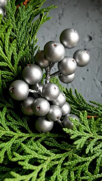 Close Up Cedar Wreath With Silver Berries for Winter Holiday Decor