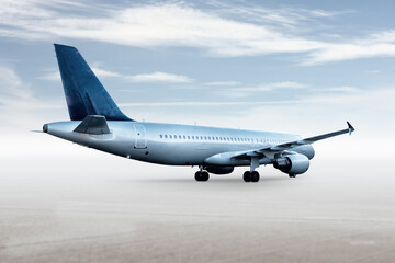 Passenger aircraft isolated on bright background with sky