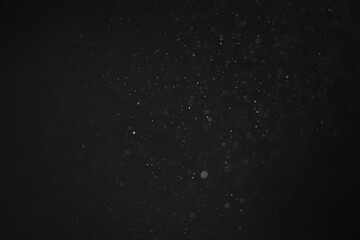 abstract dust particles over black background for overlay