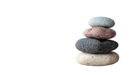 Balanced stack of smooth zen stones and gray pebbles isolated on white for relaxation and harmony