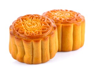 Two intricately designed baked pastries, golden-brown, on white backdrop