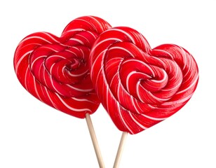 Two swirling, red and white heart-shaped lollipops on wooden sticks