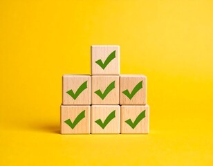 Wooden blocks stacked in a pyramid, each with green checkmark on them
