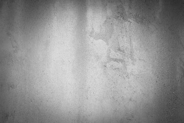 Smooth grey texture with brush stroke pattern and subtle surface variations.