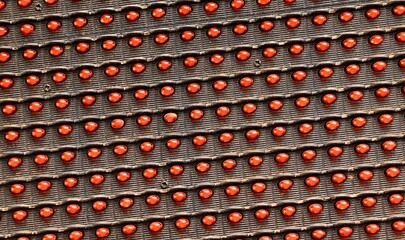 Background, texture panel with red LEDs