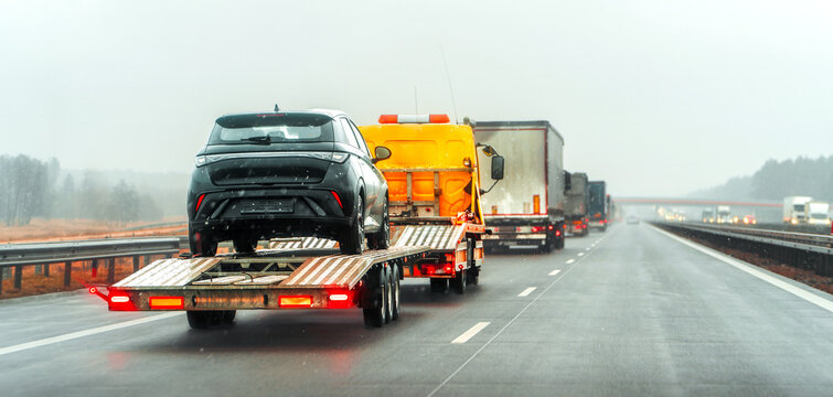 Breakdown service towing accident-damaged vehicle