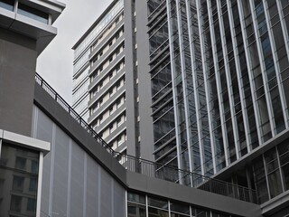 a horizontal low-angle view of modern office building exteriors in a corporate park of shenzhen, china