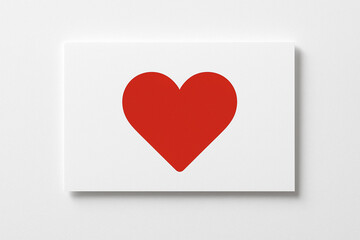 Elegant red heart on white canvas offers a clean, modern symbol of love and romance for Valentine's Day, weddings, or heartfelt messages of affection and care