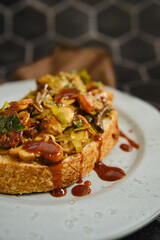 Delicious mushroom sandwich with honey, enoki, and champignon on fresh bread