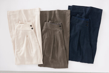 Folded wide leg linen pants in beige brown and dark blue colors